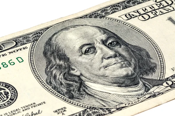 Ben Franklin's gezicht met druppels water op ogen op de oude ons $100 dollar bill macro. — Stockfoto