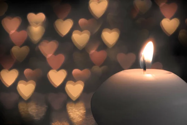 Candle on bokeh hearts background. Vintage style. — Stock Photo, Image