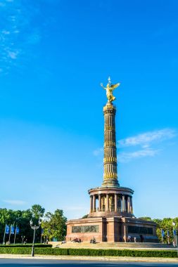 Victory Column in Berlin on sunny day with blue bright sky.  clipart