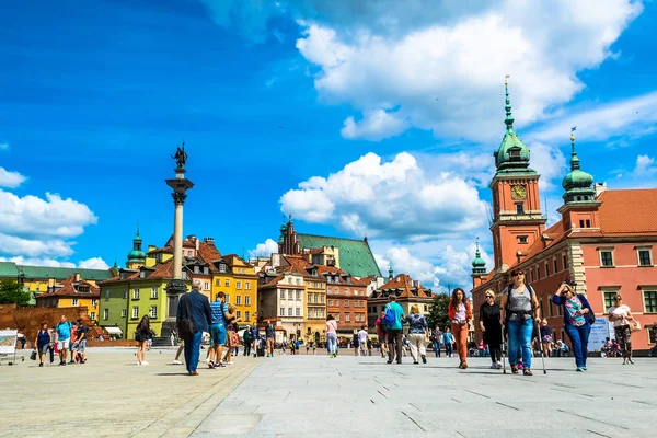 Warsaw, Poland  July 14, 2017: Plac Zamkowy - The castle square in Warsaw is located between the Warsaw royal palace and the Warsaw Old Town. Sunny summer day. Horizontal photo. Stock Picture