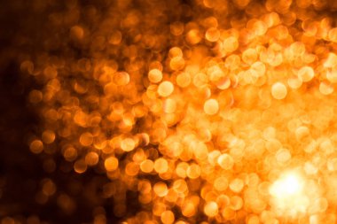 Soyutlama arka plan sarı turuncu ateşle daireler fişekleri. Noel soyutlama arka plan sarı daireler ile.