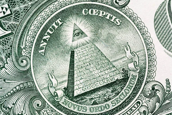 Pyramid macro close-up on a banknote of 1 US dollars. Detail of one dollar bill. Big large size.