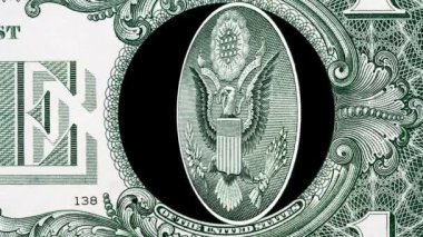 Yaratıcı 4k parallax video ayrıntıları 1 Amerikan doları banknotunun dönüşümlü kartal görüntüsü. Bir Amerikan Doları makro görünümü.