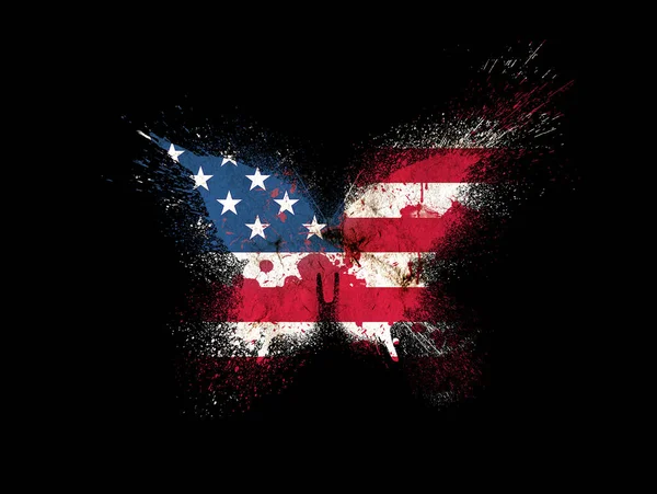 Butterfly silhouette in colors of USA national flag in grunge style with paint splatters isolated on a black background. American flag in the form of a butterfly silhouette with paint splash.