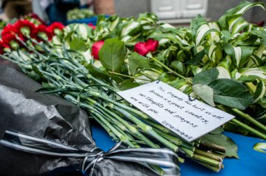 People in Kyiv honors the memory of those killed in terrorist attack in Manchester. clipart