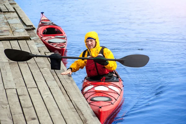 Man kayaking on the red kayak on the river 13 — Stock fotografie