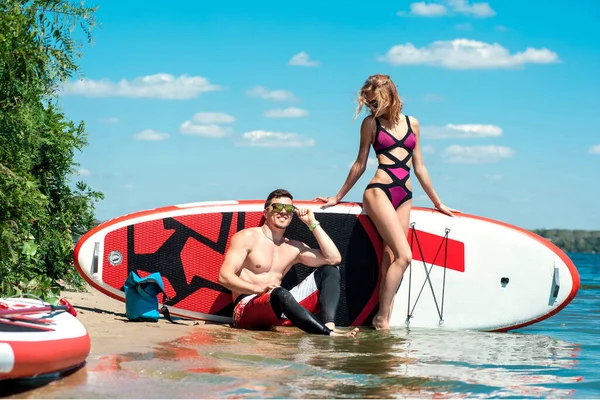 Man Woman Stand Paddleboarding Lake Young Couple Doing Watersport Lake Stock Picture