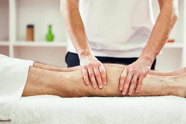 Young Man Enjoying Massage Spa Treatment — Stock Photo, Image