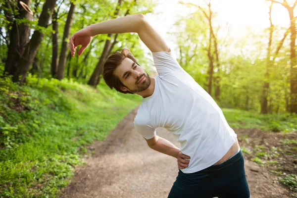 Jeune Homme Fait Exercice Étire Son Corps — Photo