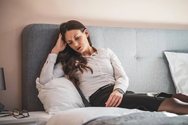 Tired Depressed Businesswoman Lying Bed Hotel — Stock Photo, Image