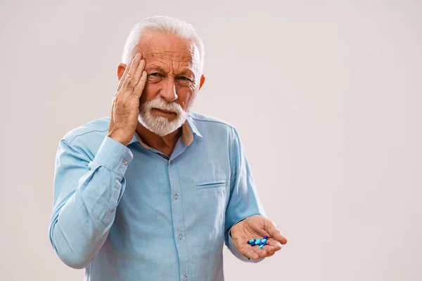 Portrait Serious Senior Man Who Having Headache Holding Pills — Stock Photo, Image