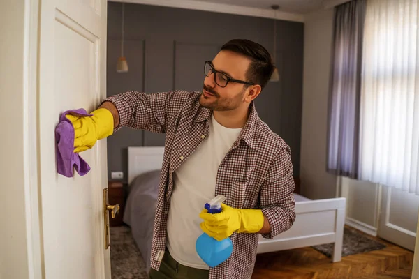 Young Man Obsessively Cleaning Apartment — 스톡 사진