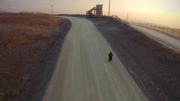 Man Runs Military Base Morning — Stock Video