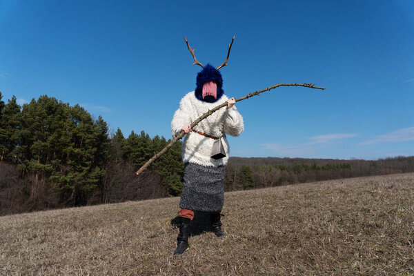 Kukeri, mummers perform rituals with costumes, intended to scare away evil spirits during