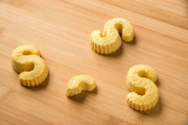 Three yellow biscuits — Stock Photo, Image