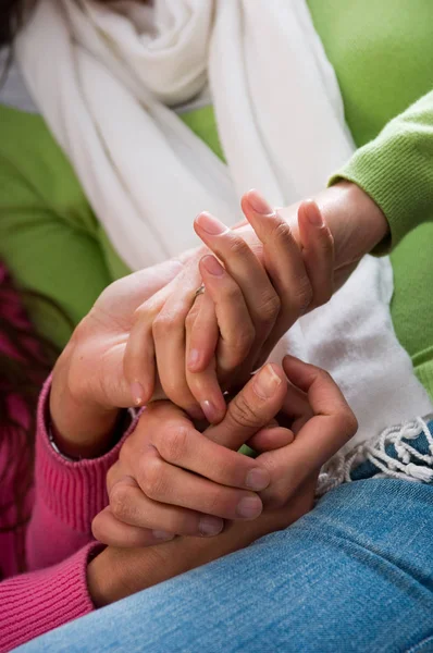 Two woman joining hands — Stock Photo, Image