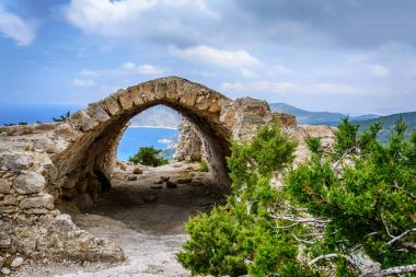 Ruins and picturesque landscapes in Monolithos castle, Rhodes island, Greece clipart