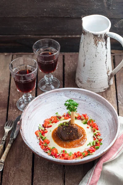 Lamb shank with eggplant puree, traditional turkish dish — Stock Photo, Image