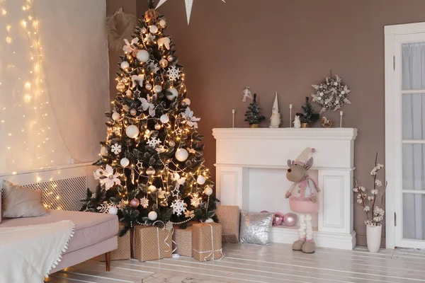 Winter home decor. Christmas tree in loft interior. Old vintage furniture