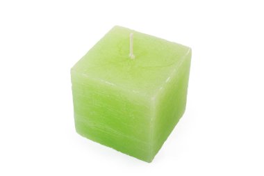 beyaz zemin üzerine yeşil mum