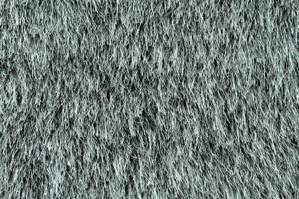 Gray artificial plain fur texture. Macro. Closeup