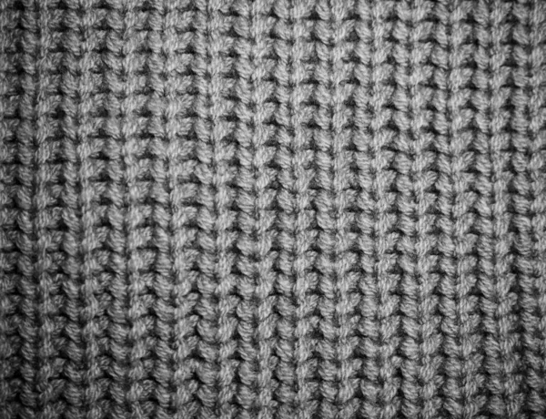 a gray knitted pattern background