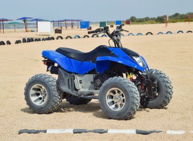 Small ATV rentals. Rental services on the beach by the sea clipart