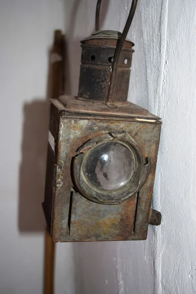 Restored vintage kerosene lantern with a lens Stock Image