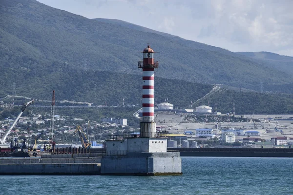 Lighthouse in the port city. Lighthouse in Tsemess bay near Novorossiysk