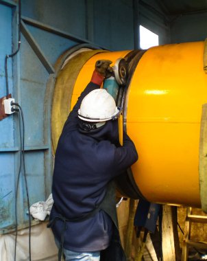 Safety at work. Welding and installation of the pipeline. Industrial weekdays welders and fitters clipart