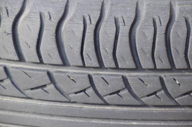 Araba tekerlek lastik desen arka plan. Lastik geçirilmiş.
