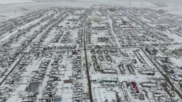 Вид зверху зимового села . — стокове відео