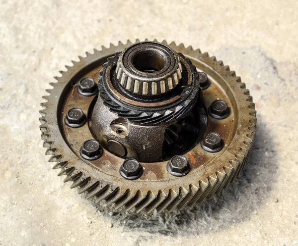 Dismantled box car transmissions. Gear with bearings. The gears on the shaft of a mechanical transmission.