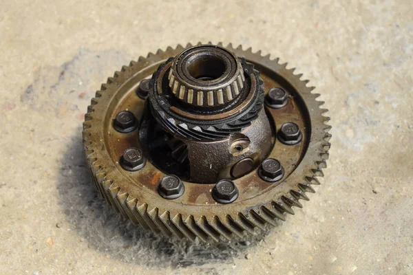 Dismantled box car transmissions. Gear with bearings. The gears on the shaft of a mechanical transmission.