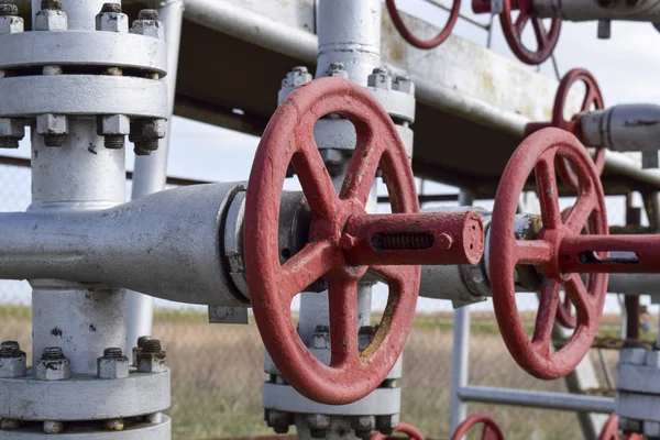 Shut-off valves on the high-pressure well flowing equipment. Oil equipment Stock Photo