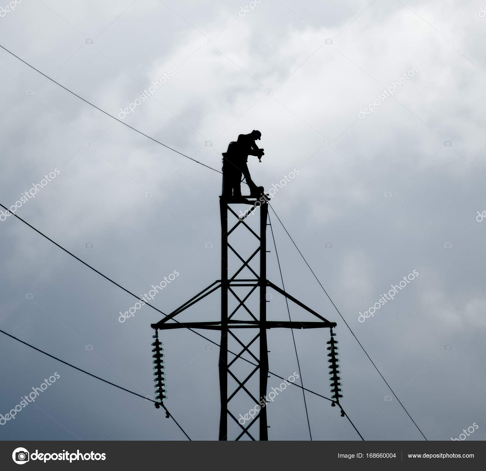 Assembly and installation of new support of a power line Stock Photo by