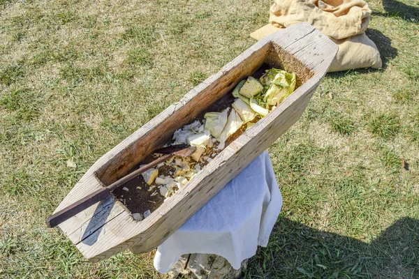 Wooden trough for cutting cabbage