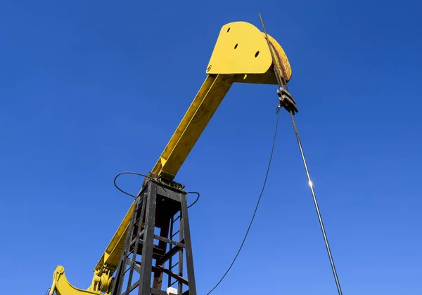 Pumping unit as the oil pump installed on a well — Stock Photo, Image
