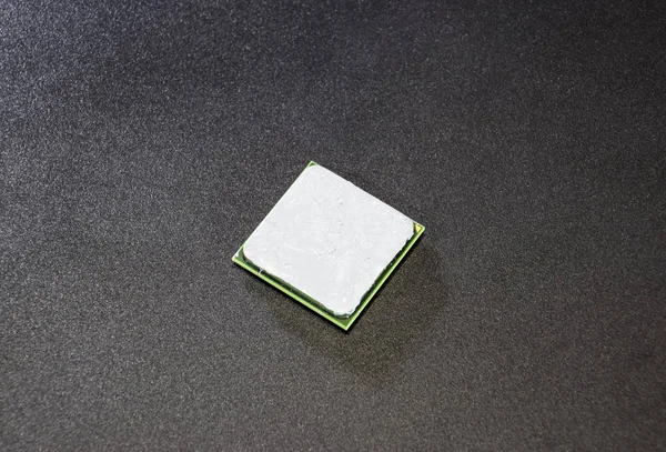 The processor of the computer with the thermal paste applied on it. Details of the computers system unit