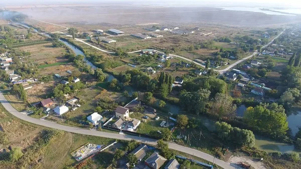 View from the top of the village. Houses and gardens. Countryside, rustic landscape. Aerial photography — Stock Photo, Image