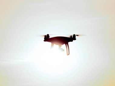 Quadrocopters siluet güneşin arka planı