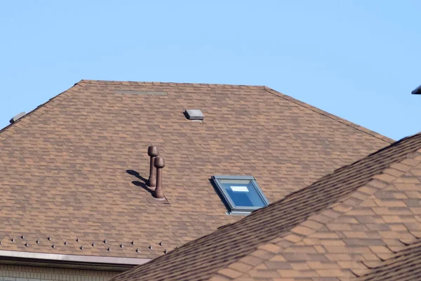 Decorative metal tile on a roof — Stock Photo, Image