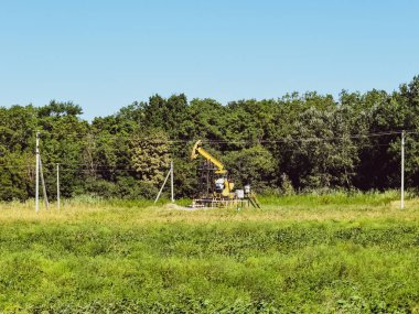 Olarak bir kuyu üzerinde yüklü petrol pompa pompa birimi