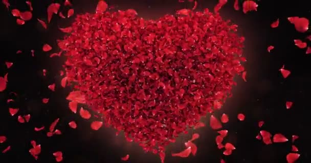 Pétalos rojos de la flor de Rose que caen en el lazo encantador del fondo de la forma del corazón 4k — Vídeo de stock