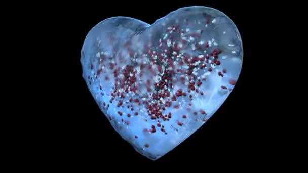 Coeur rotatif en verre de glace bleu avec flocons de neige et boules rouges Alpha Matte Loop 4k — Video