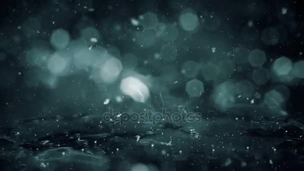 Hiver Motion arrière-plan noir lumières neige tombant sur glace déconcentré bokeh boucle 4k — Video