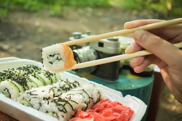 Picnic. Sushi outdoors on a summer day