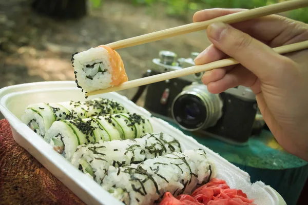 Picnic. Sushi outdoors on a summer day