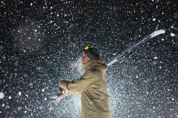 Night landscape with silhouette skier Stock Image