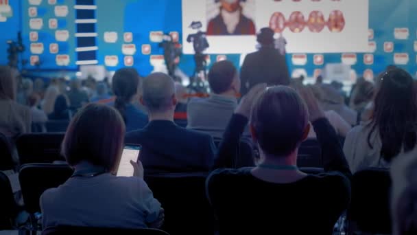 Seminar audience from stage, business people conference meeting congress coach speaker group businessman forum training studying seminar, speech person about management economics politics problem 4 K — Stock Video